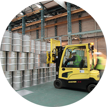 Forklift picking up cylinders